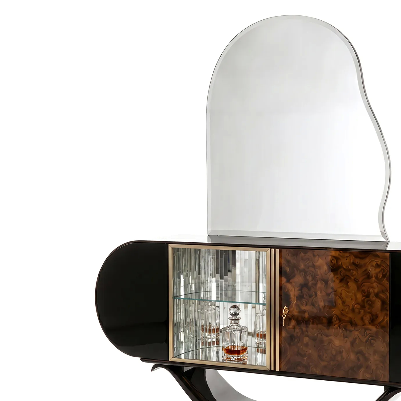 Detail of Florence bar cabinet by KOKET, crystal decanter and glasses on a curved shelf inside the mirror-mosaic interior.