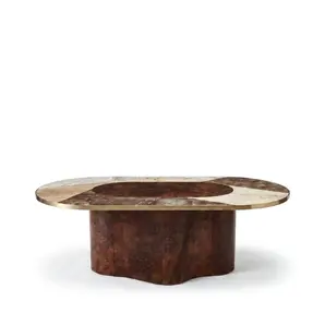 Decodiva dining table by KOKET, oval marquetry top in marble and walnut root, satin brass rim, sculptural walnut root base.