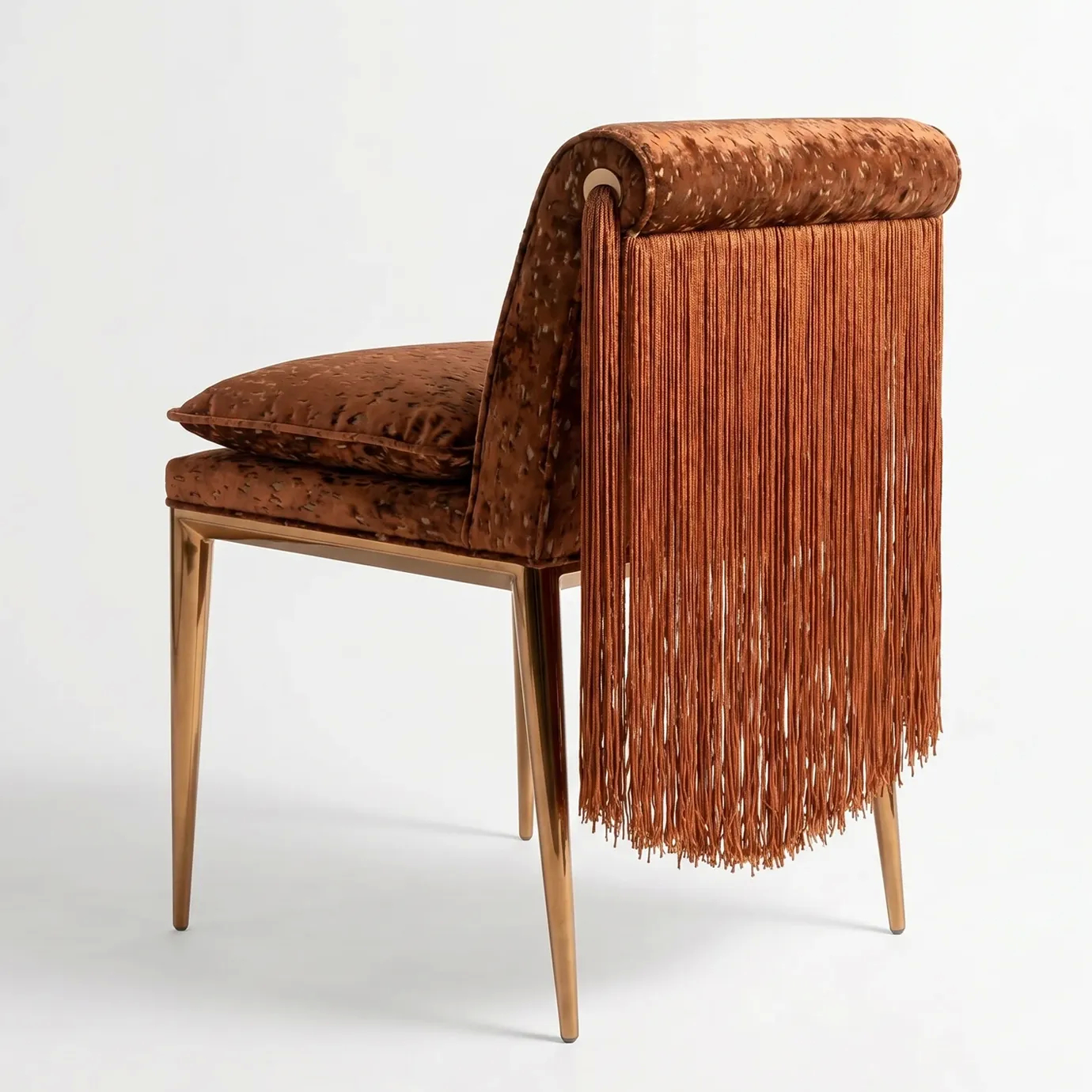 KOKET Women Art Deco luxury chair with brown velvet upholstery, cascading fringe back and slender gold legs.