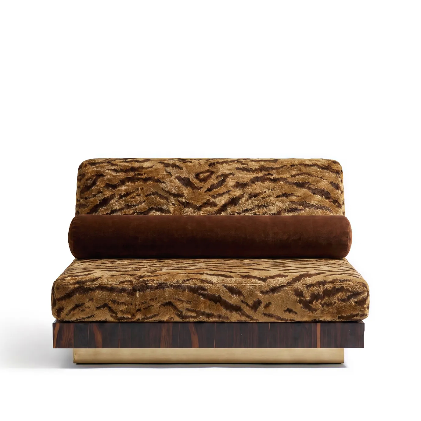 Eileen lounge chair by KOKET, front view, tiger-print velvet cushions and brown bolster on walnut burl and brass plinth.