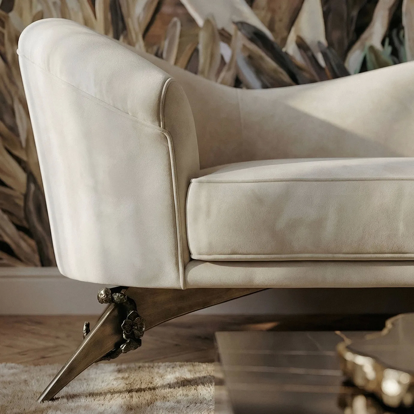 Cream-colored Colette Sofa with gold-accented legs set against a dramatic mural of abstract figures and botanicals—creates a sophisticated, artful living room centerpiece.