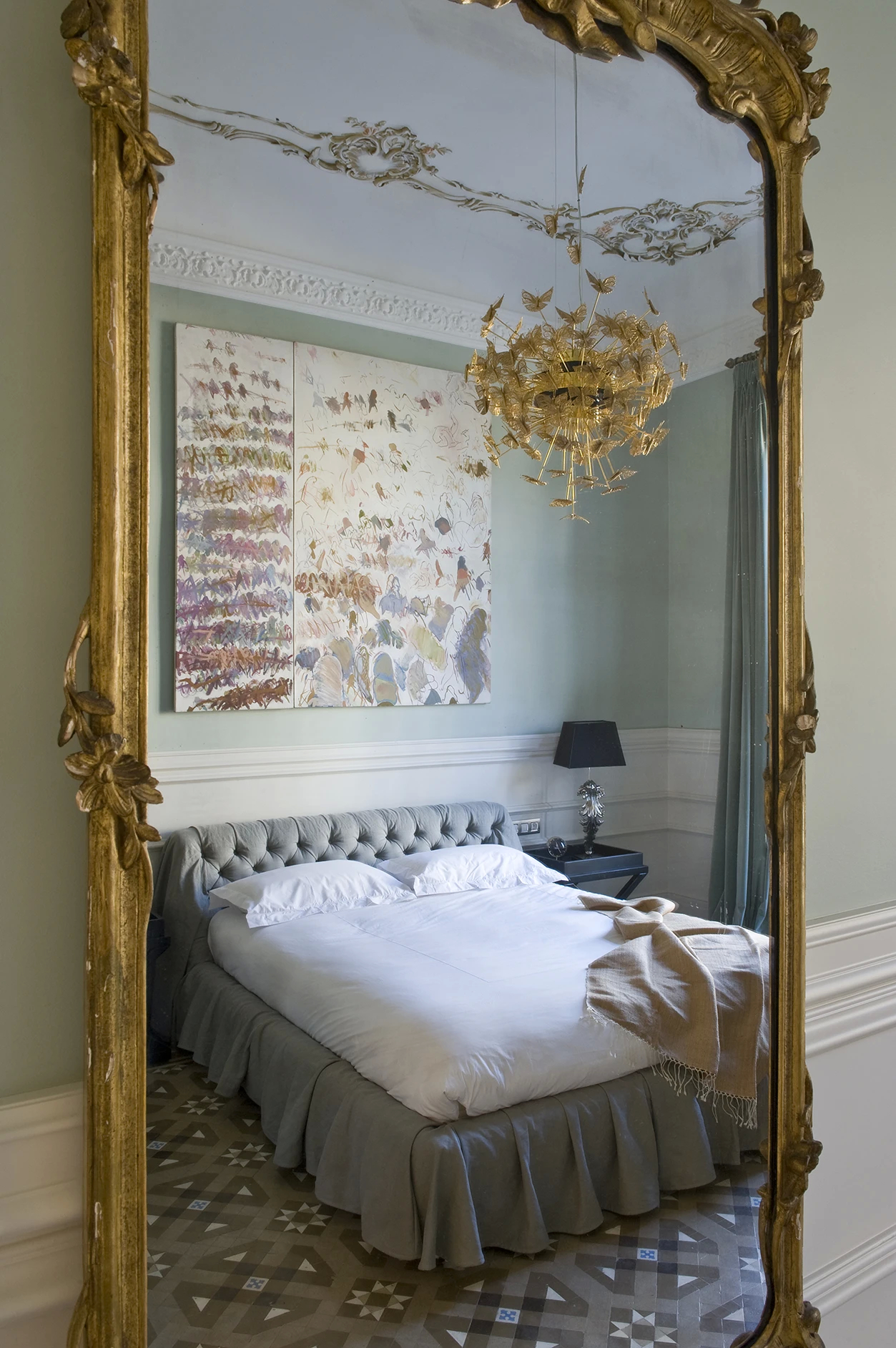 A French chateau-inspired bedroom showcasing Koket's elegant Nymph Chandelier in the Art Apartment project.