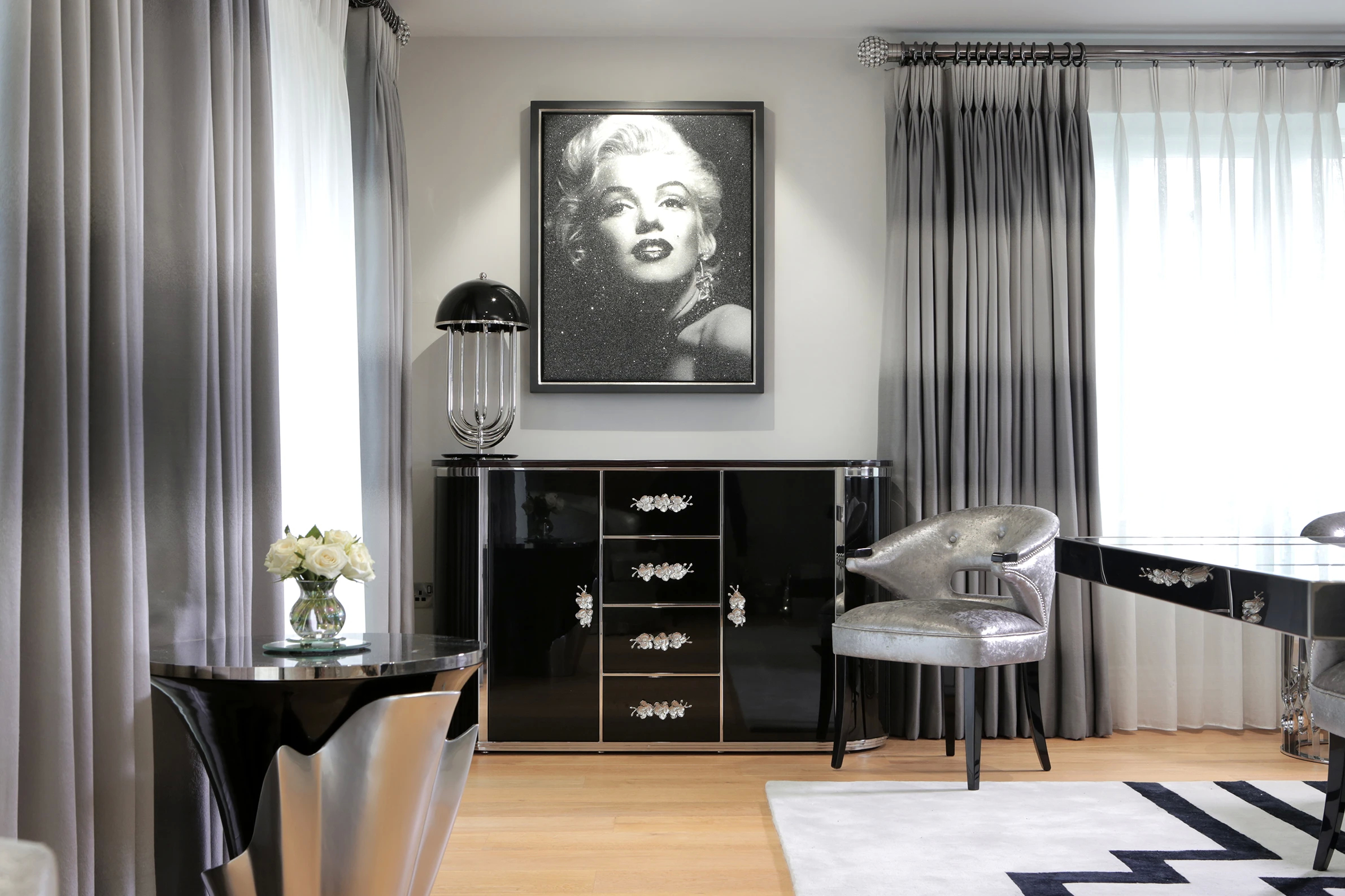 A glamorous room featuring Koket's Orchidea Cabinet and Yasmine Side Table, part of The Harbury Country House project.