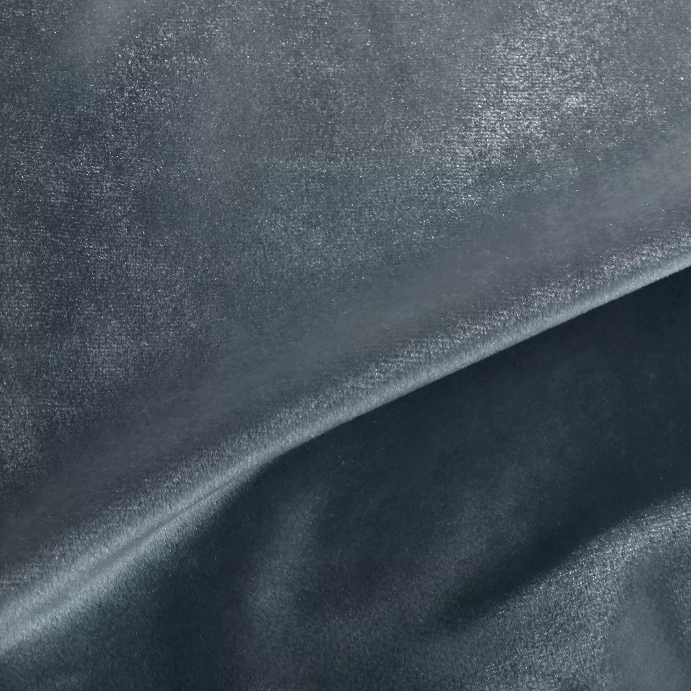 Elegant close-up of a Silky Velvet 401 fabric swatch in a luminous and soft gray-blue tone, showcasing its smooth texture and the delicate folds that highlight its modern and silky sheen.