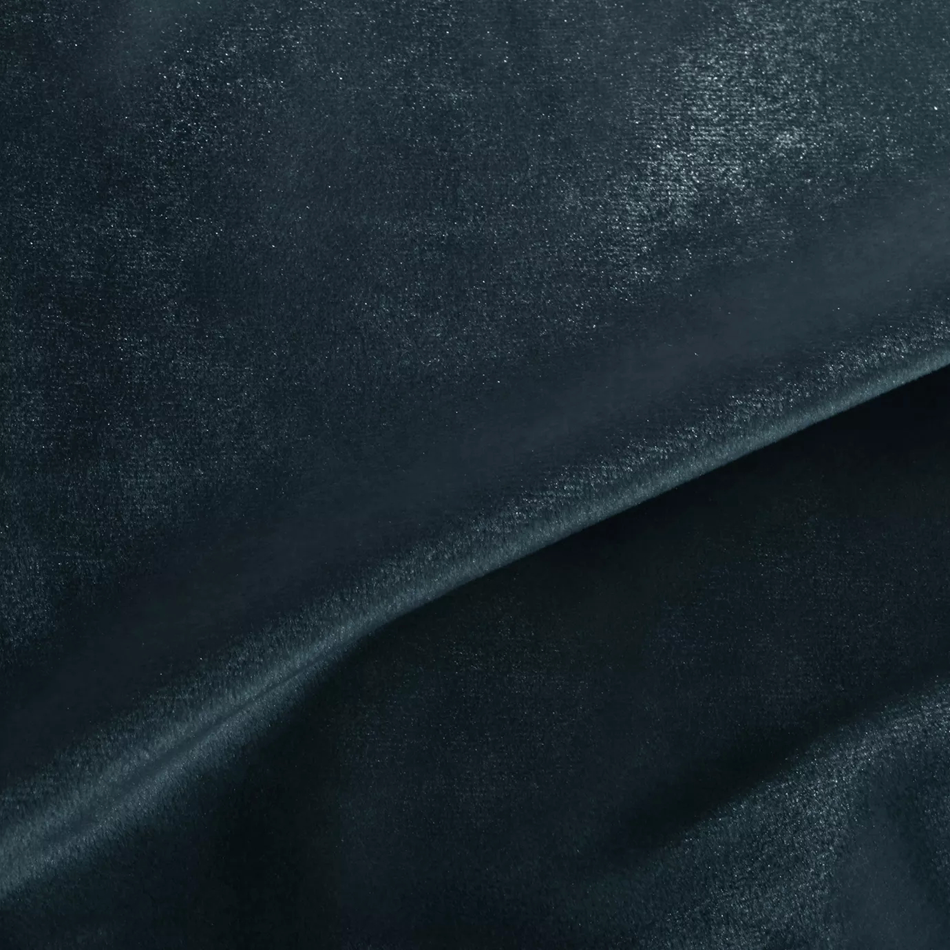 Elegant close-up of a Silky Velvet 421 fabric swatch in a deep and luminous blue-green tone, showcasing its smooth texture and the delicate folds that highlight its intense and silky sheen.
