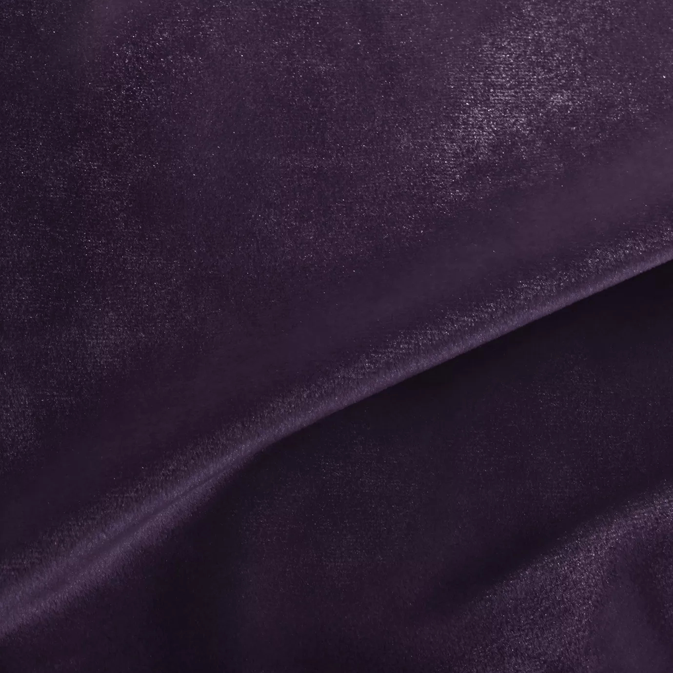 Elegant close-up of a Silky Velvet 428 fabric swatch in a luminous and intense grape purple tone, showcasing its smooth texture and the delicate folds that highlight its vibrant and silky sheen