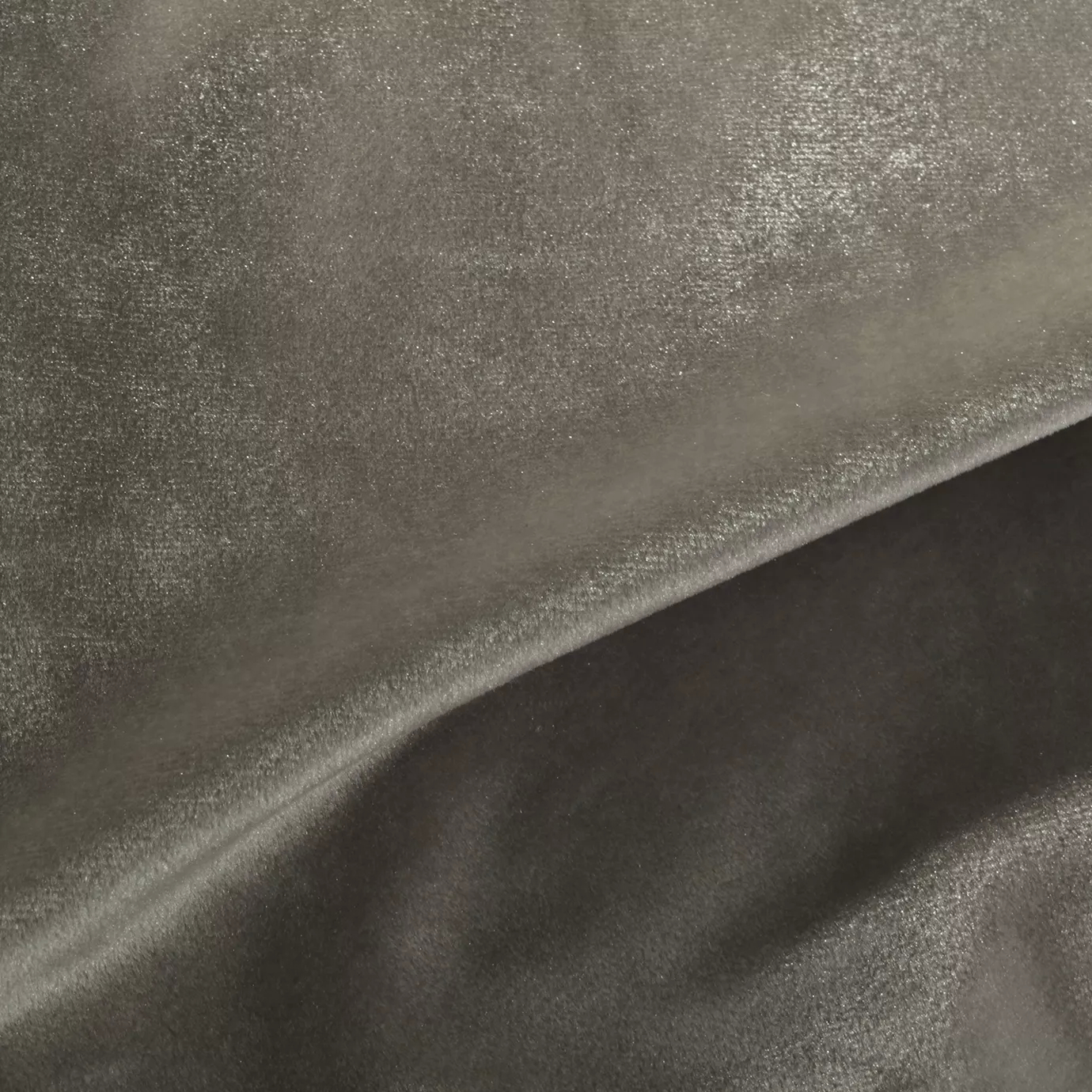 Elegant close-up of a Silky Velvet 437 fabric swatch in a light and luminous gray tone with a soft sheen, showcasing its smooth texture and the delicate folds that highlight its understated elegance.