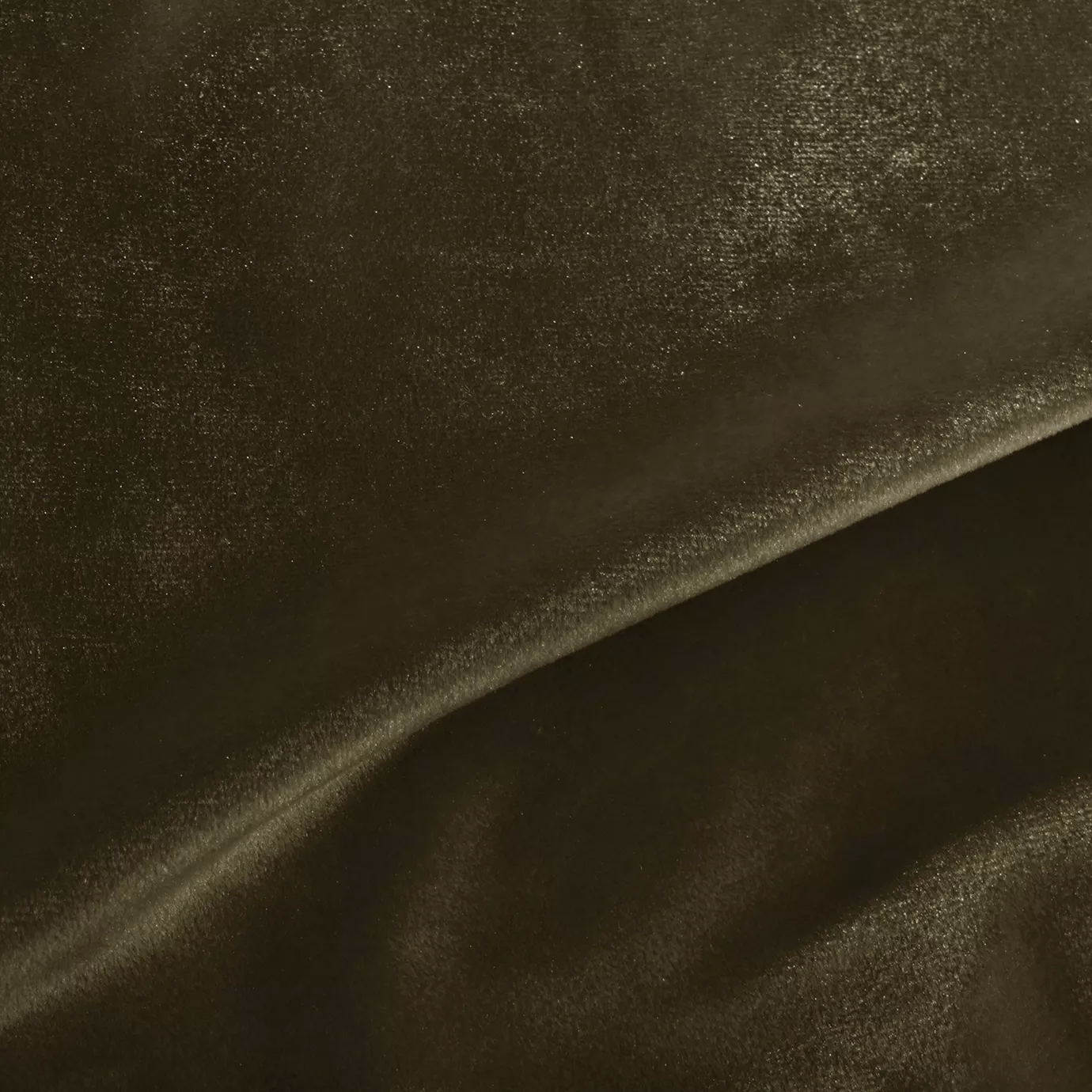 Elegant close-up of a Silky Velvet 467 fabric swatch in a luminous and soft olive brown tone, showcasing its smooth texture and the delicate folds that highlight its natural and earthy elegance.
