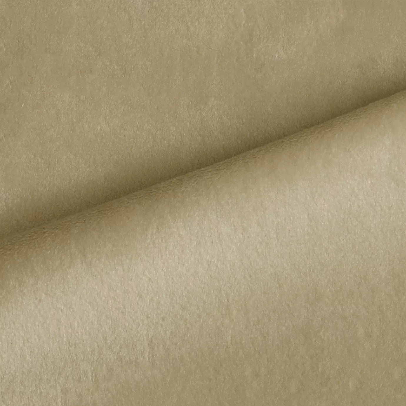 Elegant close-up of a Radiance Velvet Pale Sand fabric swatch in a pale and luminous sand tone, showcasing its velvety texture and the gentle folds that highlight its natural and serene elegance.