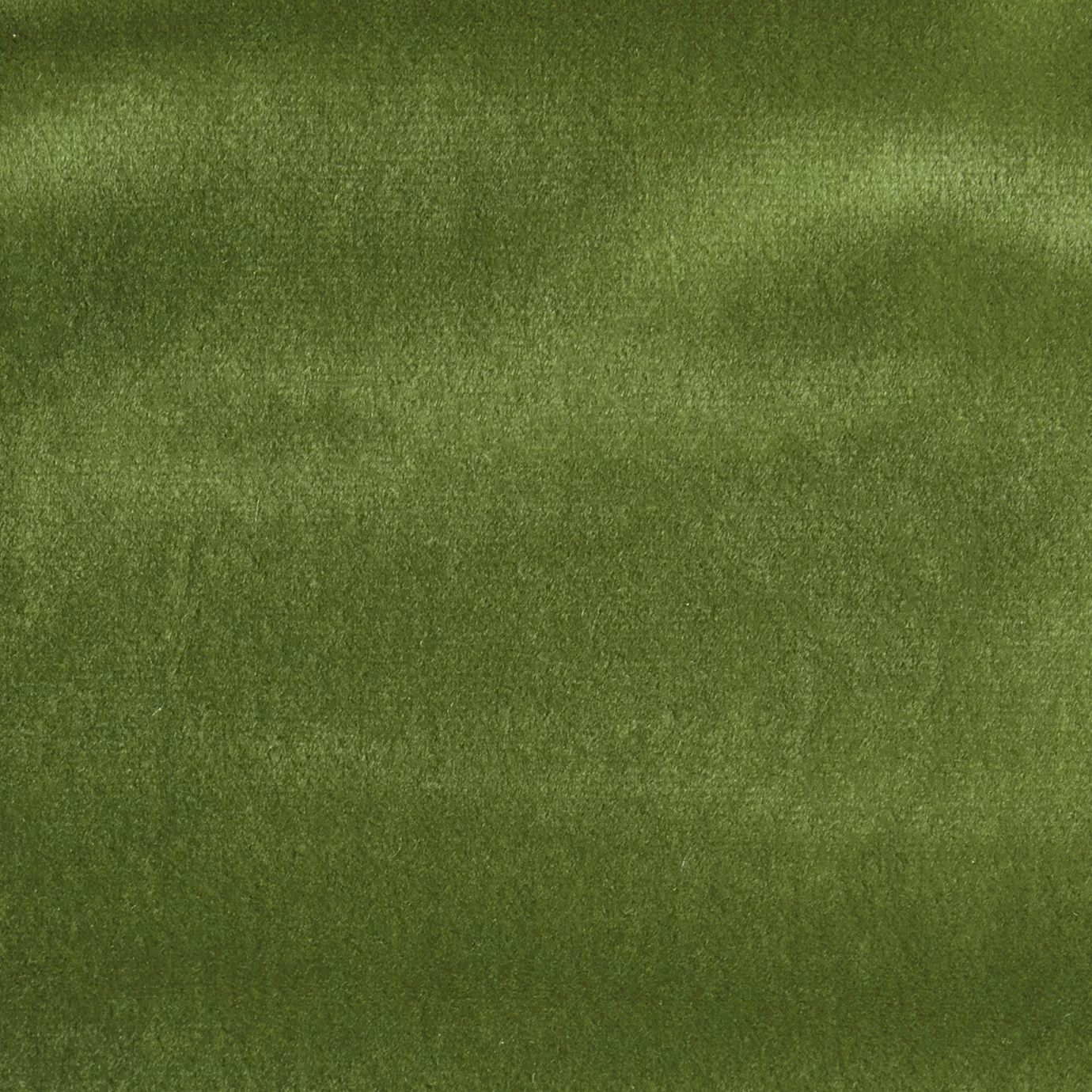 Elegant close-up of a Radiance Velvet Palm Green fabric swatch in a vibrant and luminous palm green tone, showcasing its velvety texture and a soft sheen that gives it a feeling of freshness and tropical vibrancy.