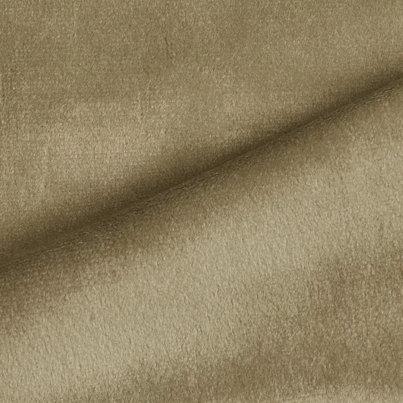 Elegant close-up of a Radiance Velvet Plaza Taupe fabric swatch in a light and luminous taupe tone with a soft sheen, showcasing its velvety texture and the delicate folds that highlight its natural and welcoming elegance.
