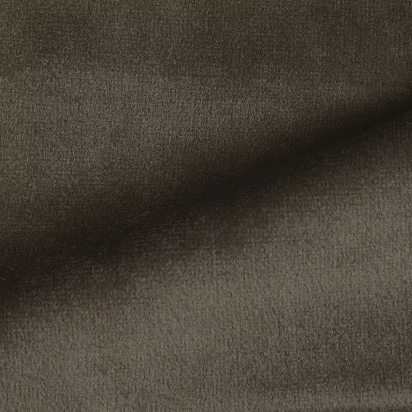 Elegant close-up of a Radiance Velvet Taupe fabric swatch in a medium and sophisticated taupe tone, showcasing its velvety texture and a subtle sheen that gives it a feeling of natural and soft elegance.