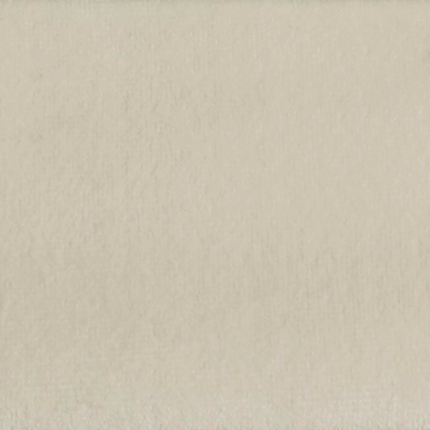 Elegant close-up of a Paris Velvet Cream fabric swatch in a soft and luminous cream tone, showcasing its velvety texture and a subtle sheen that gives it a feeling of comfort and delicate elegance.