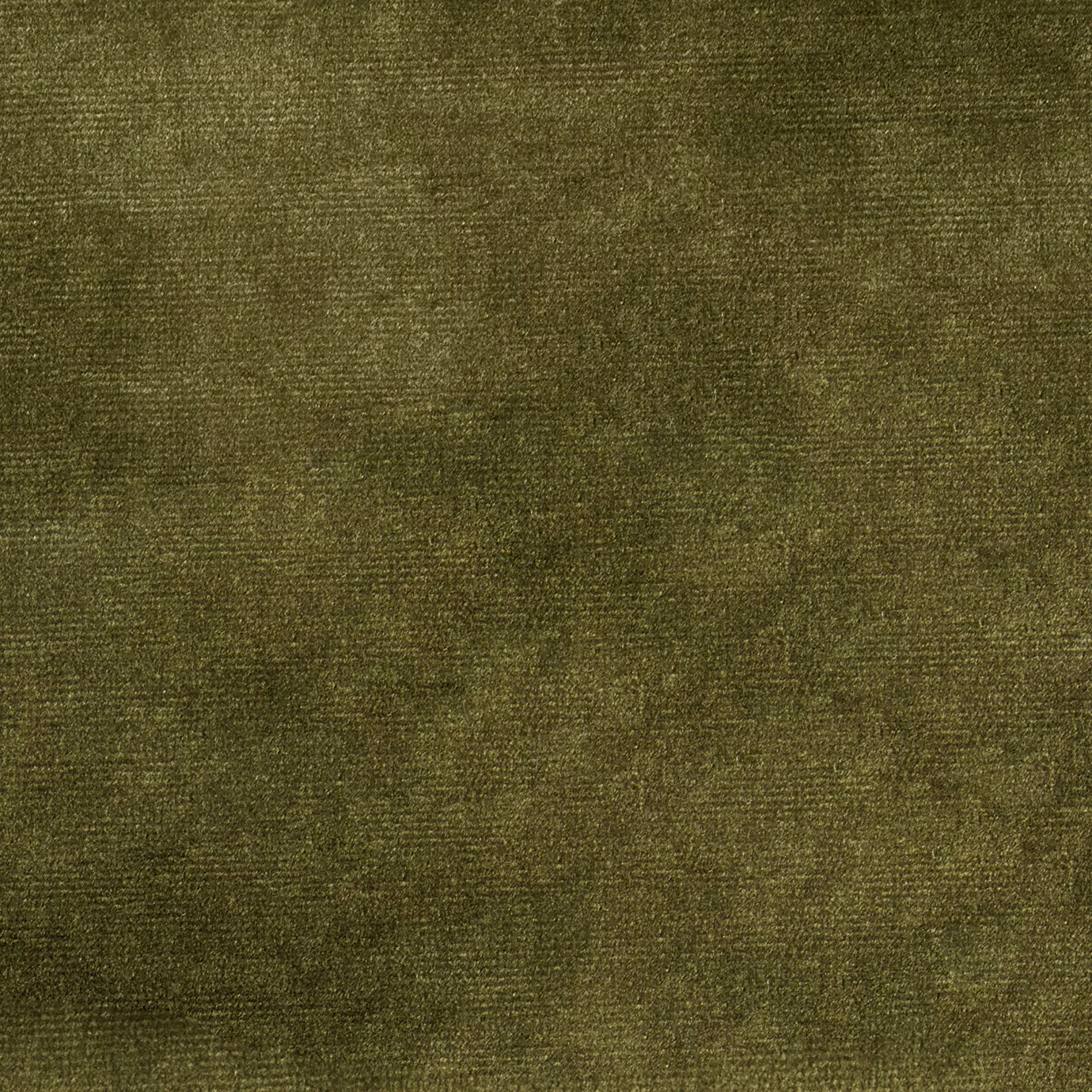 Elegant close-up of a Paris Velvet Forest fabric swatch in a deep and natural moss green tone, showcasing its velvety texture and a subtle sheen that gives it a feeling of comfort and rich, earthy elegance.