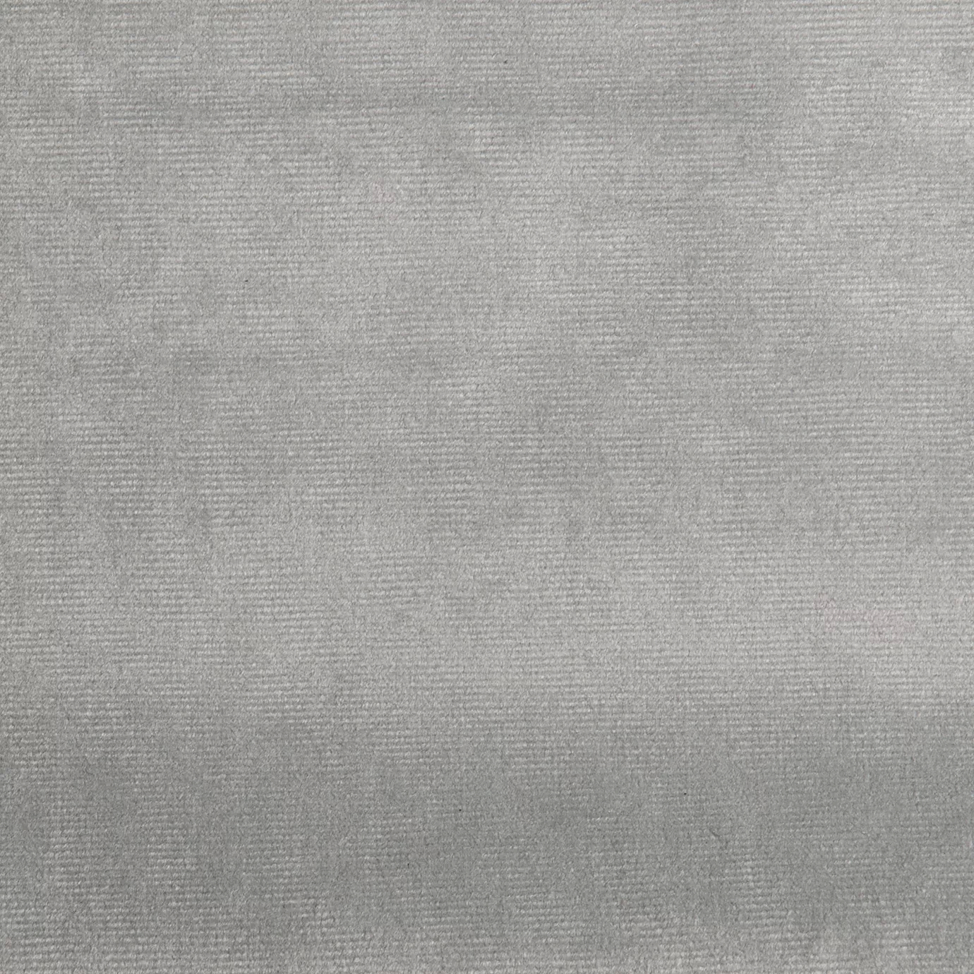 Elegant close-up of a Paris Velvet Light Grey fabric swatch in a soft and light gray tone, showcasing its velvety texture and a subtle sheen that gives it a feeling of comfort and luminous elegance.