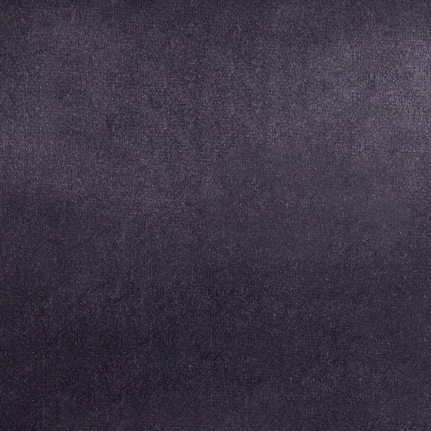 Elegant close-up of a Paris Velvet Lilac fabric swatch in a soft and delicate lilac tone, showcasing its velvety texture and a subtle sheen that gives it a feeling of comfort and serene elegance.