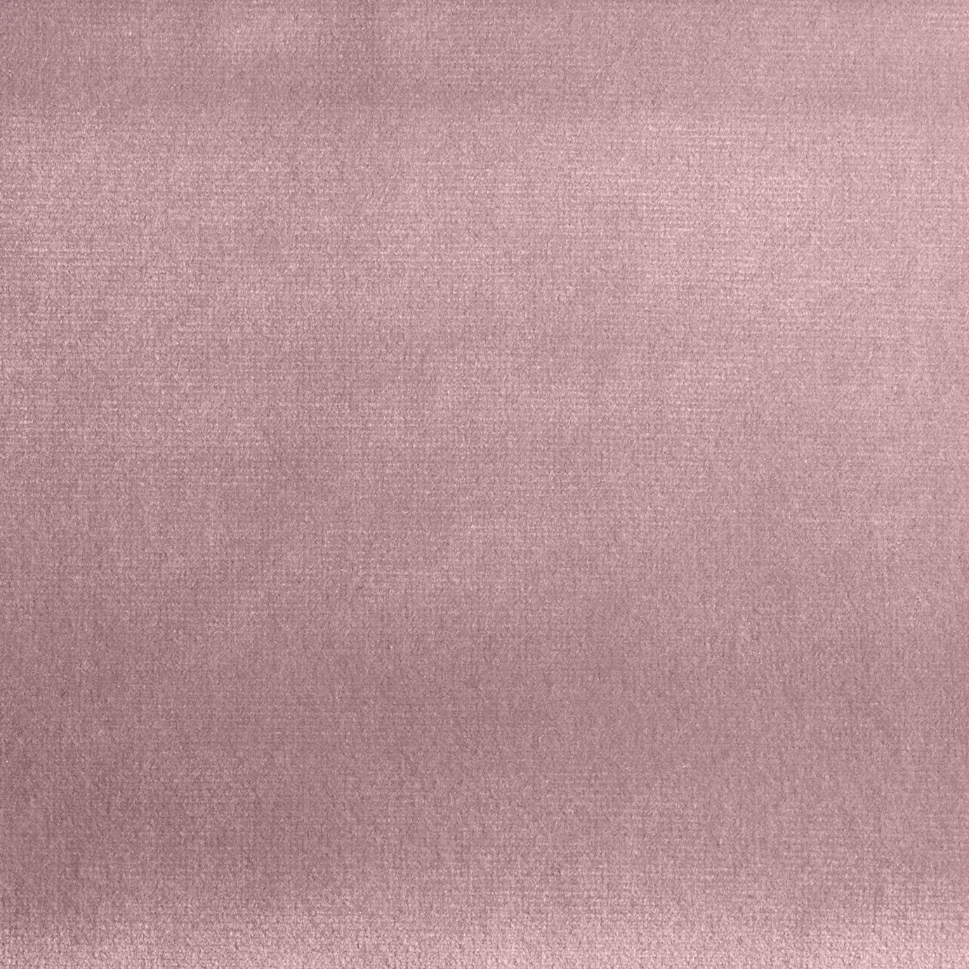 Elegant close-up of a Paris Velvet Pink fabric swatch in a soft and delicate pink tone, showcasing its velvety texture and a subtle sheen that gives it a feeling of comfort and graceful elegance.