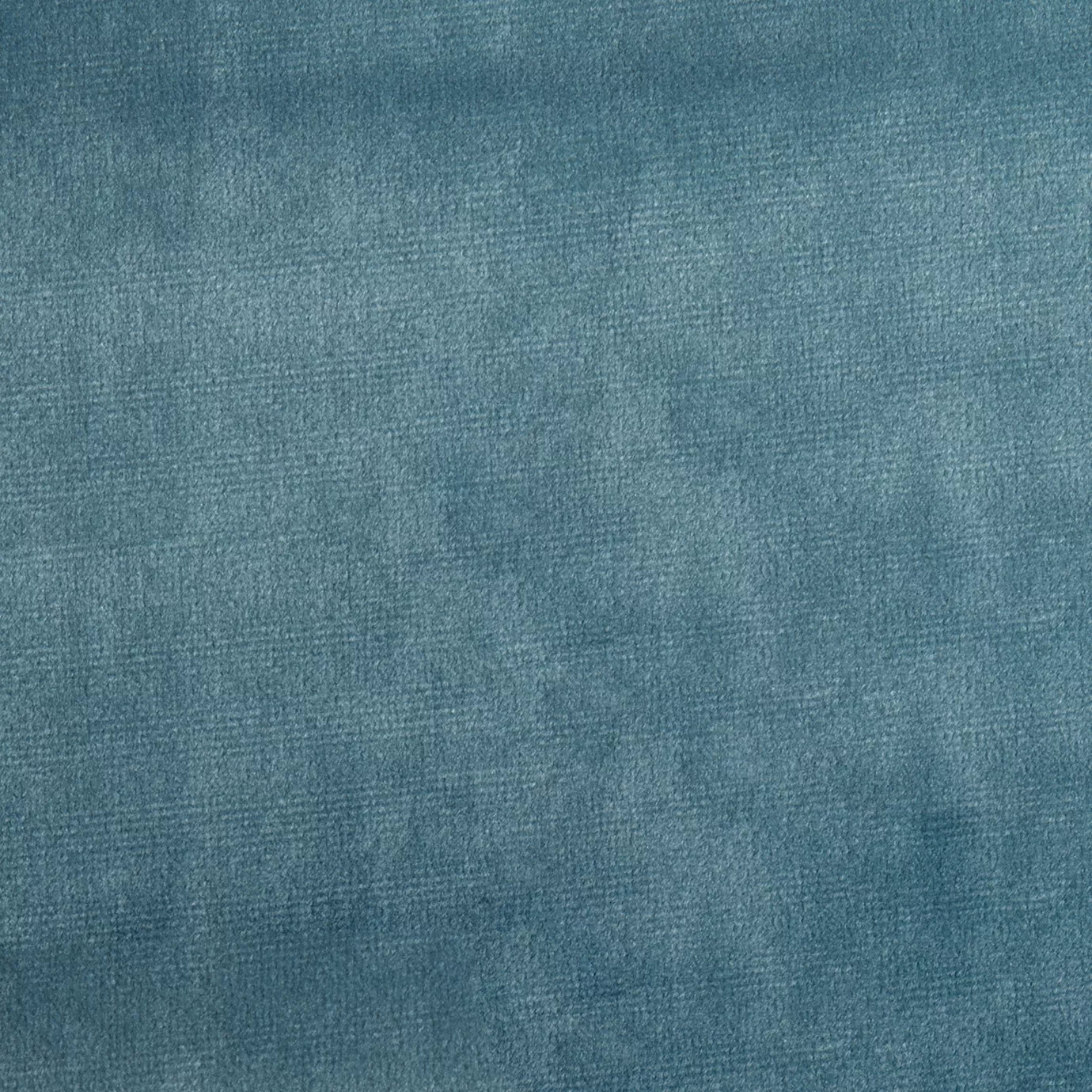 Elegant close-up of a Paris Velvet Turquoise fabric swatch in a vibrant and soft turquoise tone, showcasing its velvety texture and a subtle sheen that gives it a feeling of comfort and refreshing elegance.