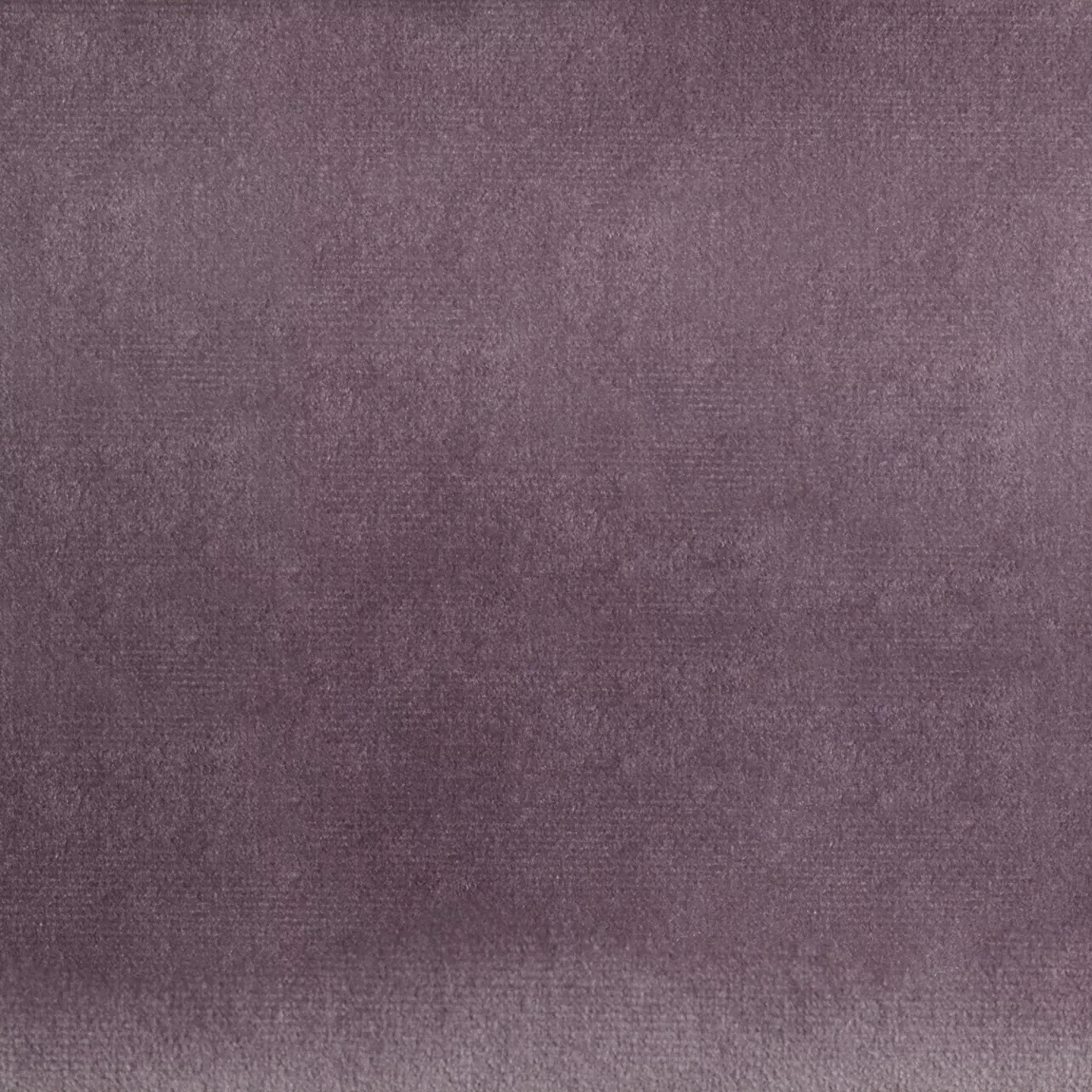 Elegant close-up of a Paris Velvet Violet fabric swatch in a soft and delicate violet tone, showcasing its velvety texture and a subtle sheen that gives it a feeling of comfort and serene elegance.