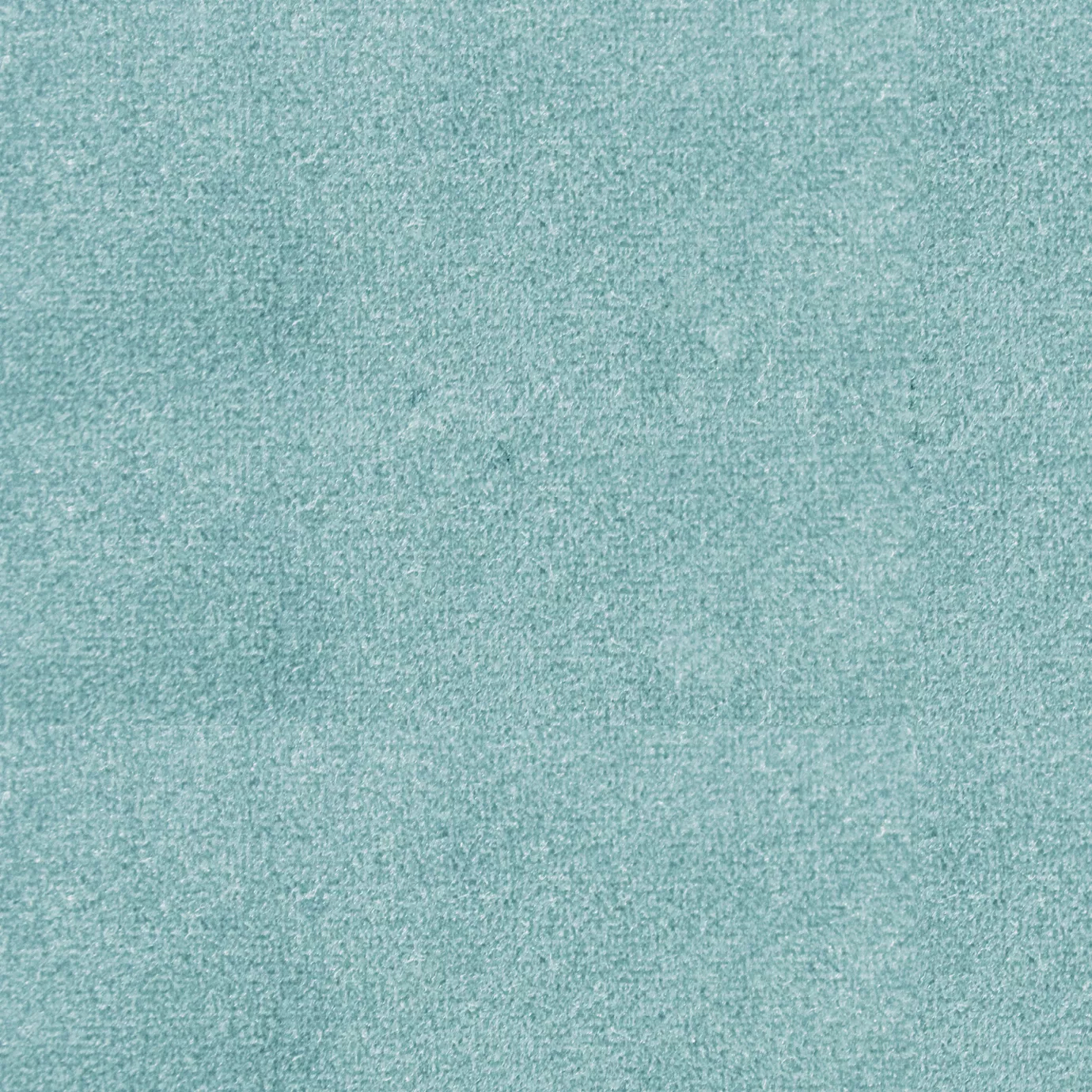 Soft and elegant close-up of a Lux Velvet 7072 fabric swatch in a light and refreshing blue-green tone, showcasing its velvety texture and a delicate sheen that gives it a feeling of comfort and serene elegance.