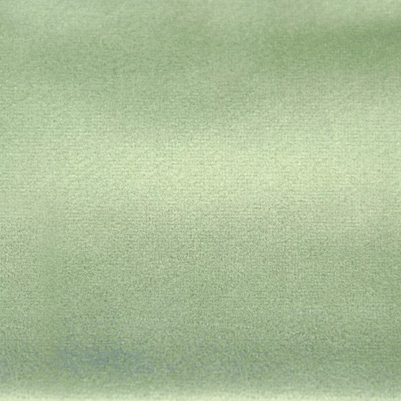 Soft and elegant close-up of a Lux Velvet Aqua Marine 7046 fabric swatch in a soft and refreshing aqua green tone, showcasing its velvety texture and a delicate sheen that gives it a feeling of comfort and natural serenity.