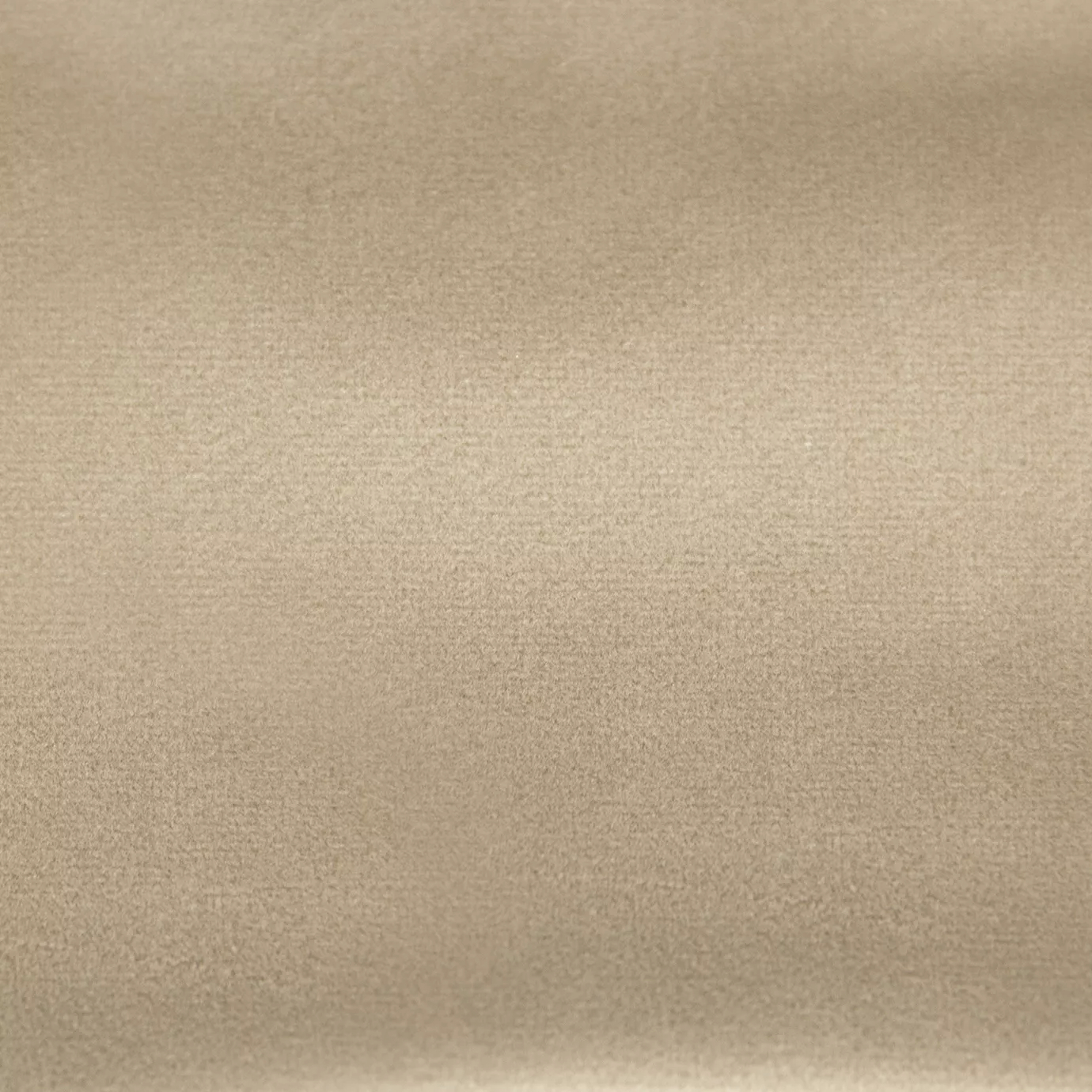 Soft and elegant close-up of a Lux Velvet Beige 0071 fabric swatch in a soft and neutral beige tone, showcasing its velvety texture and a delicate sheen that gives it a feeling of comfort and understated elegance.