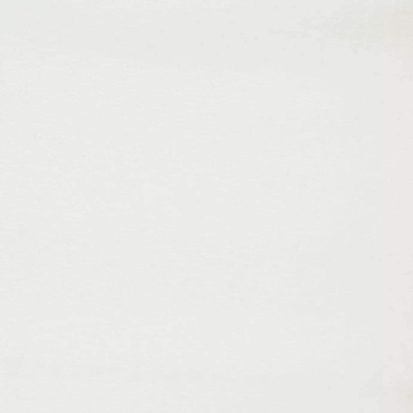 Soft and elegant close-up of a Lux Velvet Bright White 0001 fabric swatch in a pure and luminous white tone, showcasing its velvety texture and a delicate sheen that gives it a feeling of comfort and timeless elegance.