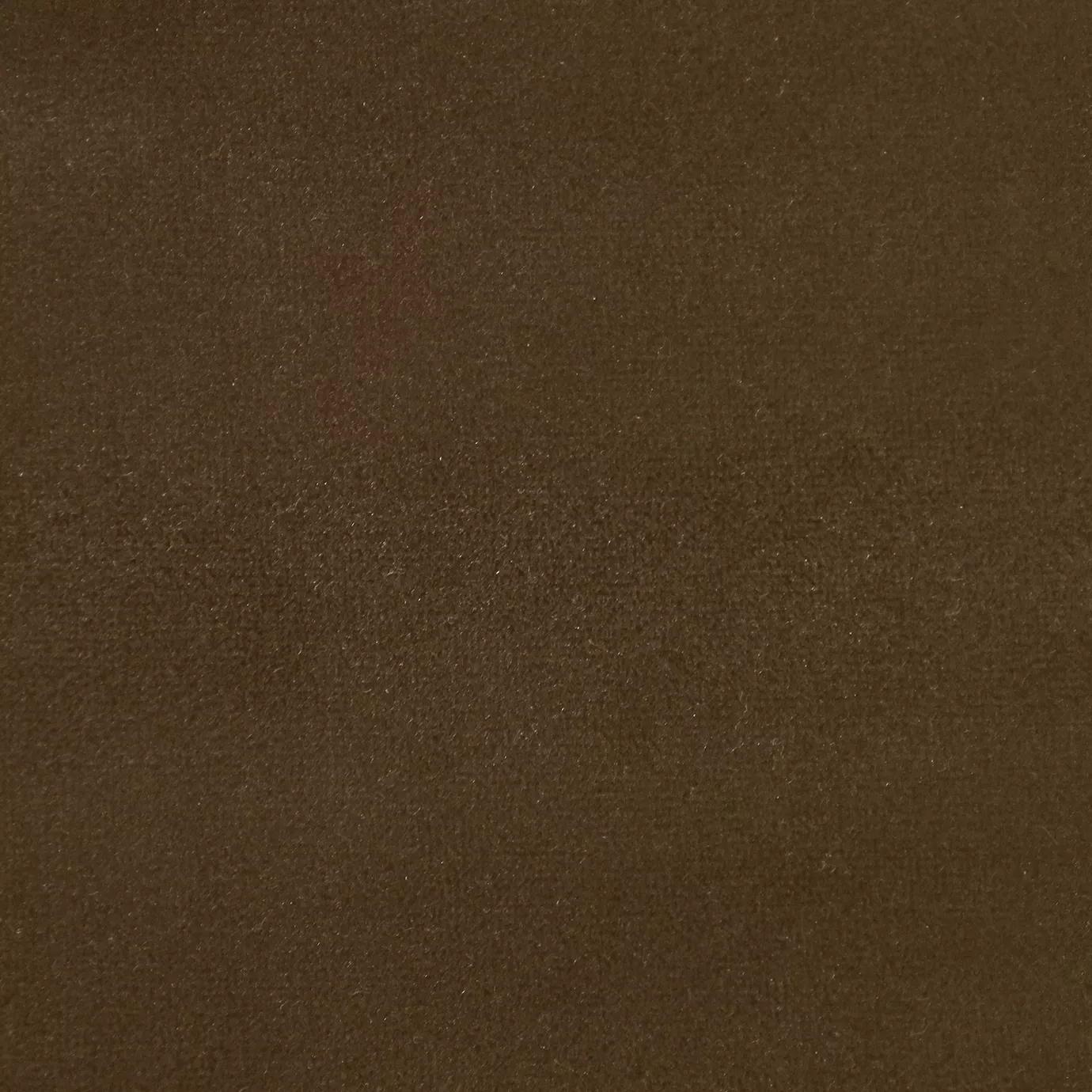 Soft and elegant close-up of a Lux Velvet Caramel 0470 fabric swatch in a warm and welcoming caramel tone, showcasing its velvety texture and a delicate sheen that gives it a feeling of comfort and natural elegance.