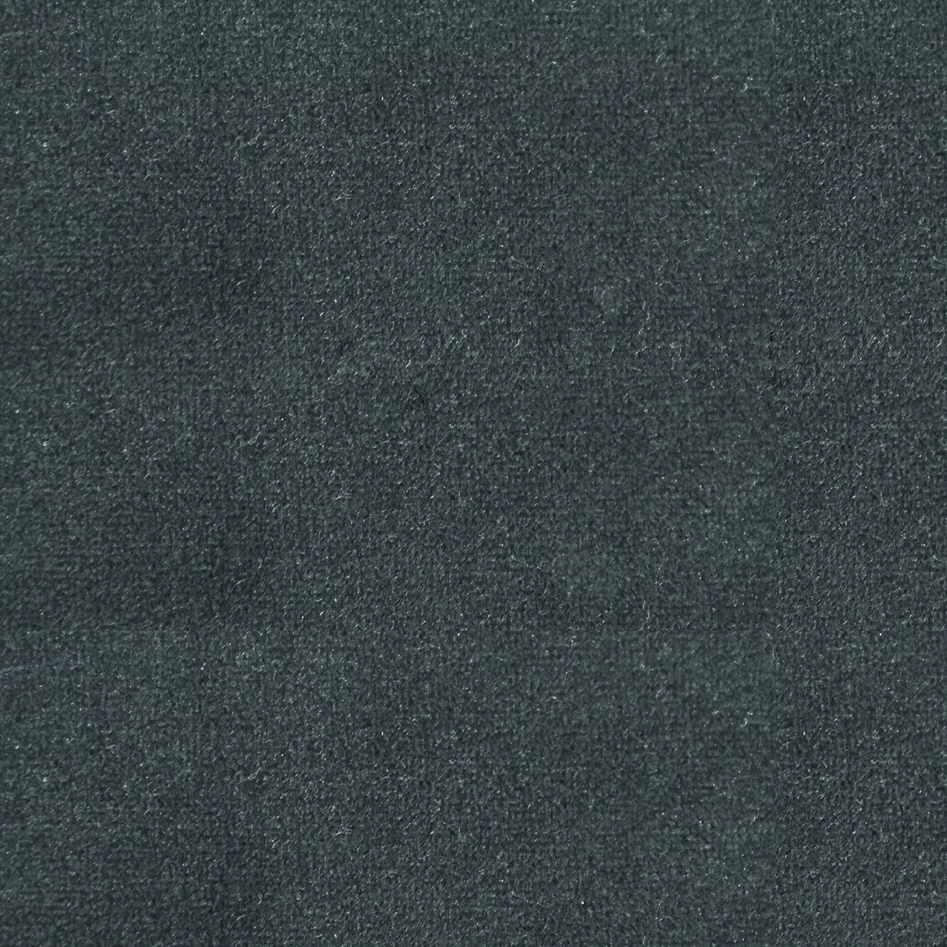 Soft and elegant close-up of a Lux Velvet Horizon Blue 6029 fabric swatch in a deep and sophisticated blue-green tone, showcasing its velvety texture and a delicate sheen that gives it a feeling of comfort and natural elegance.