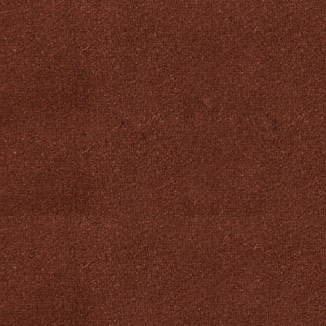 Soft and elegant close-up of a Lux Velvet Marsala 0256 fabric swatch in a rich and sophisticated marsala tone, showcasing its velvety texture and a delicate sheen that gives it a feeling of comfort and intense elegance.