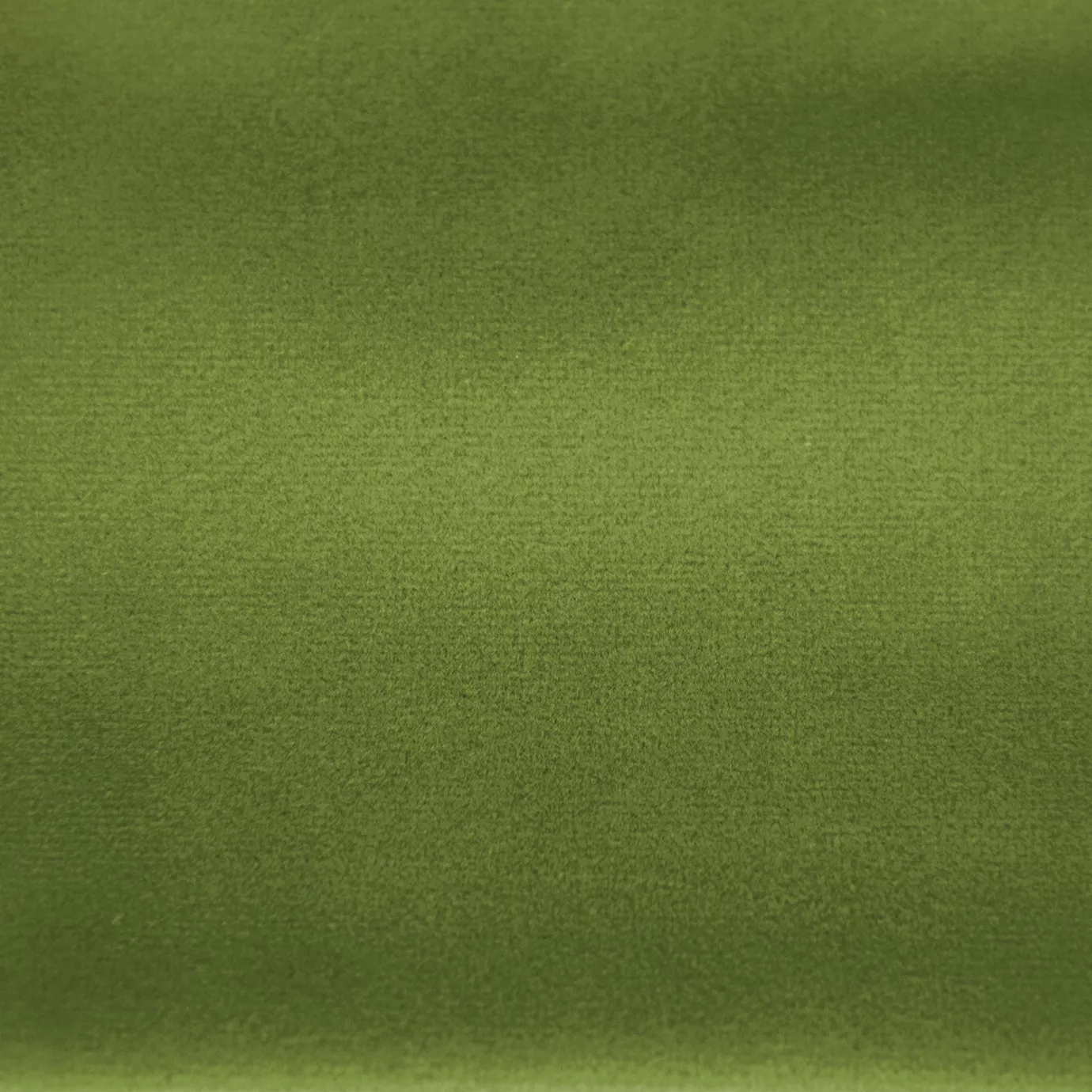 Soft and elegant close-up of a Lux Velvet Tropical Green 7076 fabric swatch in a vibrant and sophisticated tropical green tone, showcasing its velvety texture and a delicate sheen that gives it a feeling of comfort and natural elegance.