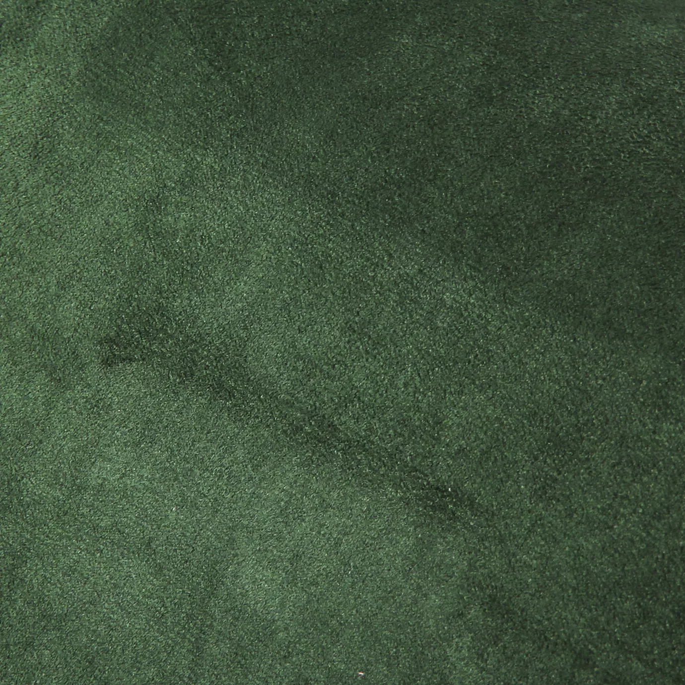 Soft close-up of an Ultra Suede Hunter Green fabric swatch in a deep and sophisticated hunter green tone, showcasing its delicate texture and a gentle touch that gives it a feeling of comfort and natural elegance.