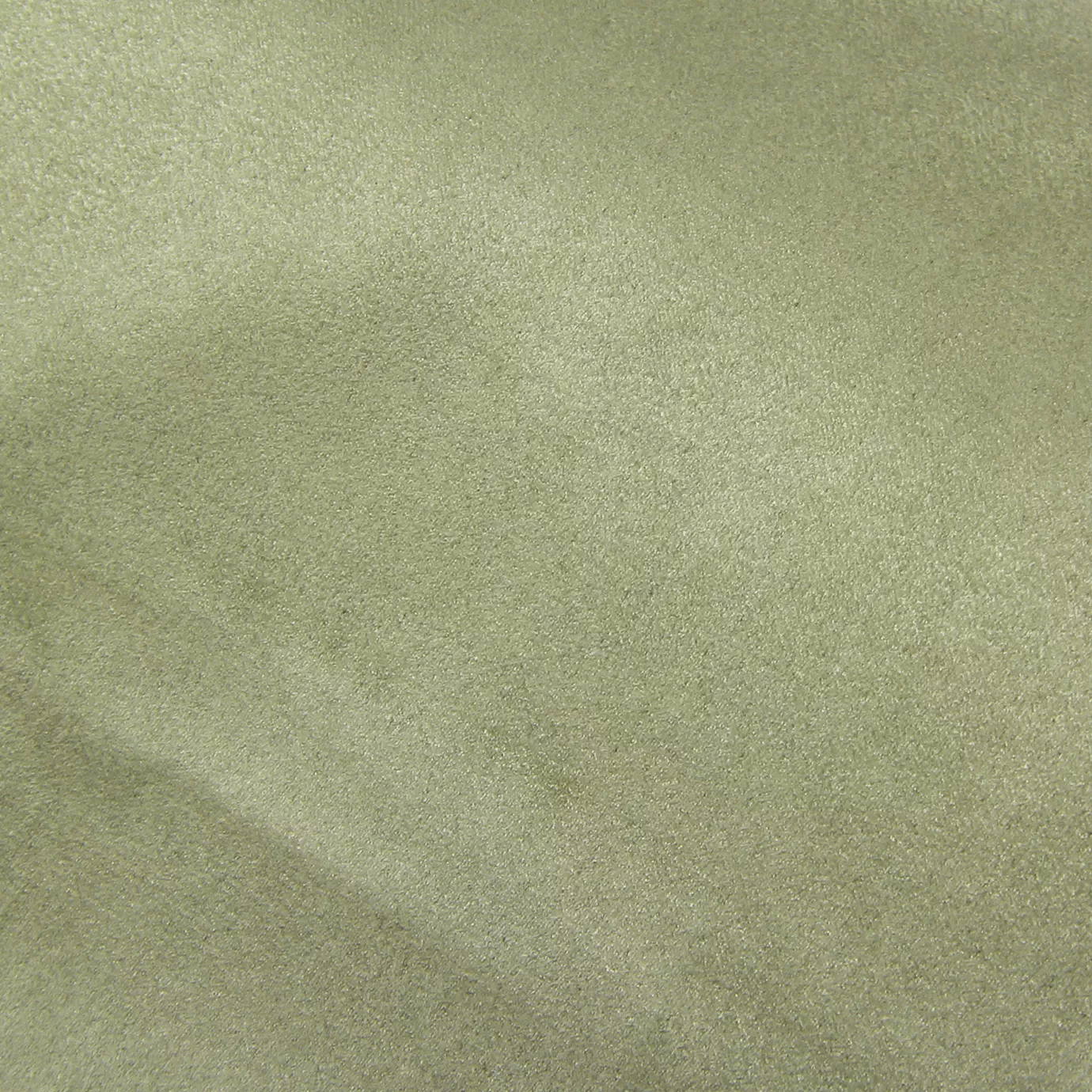 Soft close-up of an Ultra Suede Iceberg Green fabric swatch in a pale and serene ice green tone, showcasing its delicate texture and a gentle touch that gives it a feeling of comfort and understated elegance.