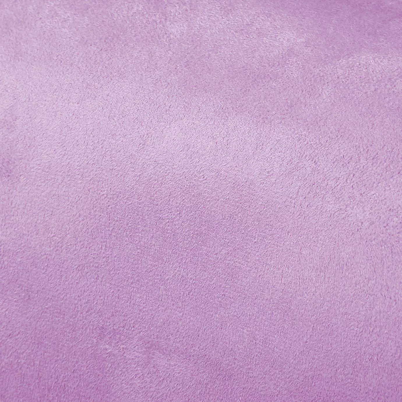 Soft close-up of an Ultra Suede Lavender Herb fabric swatch in a soft and serene lavender tone, showcasing its delicate texture and a gentle touch that gives it a feeling of comfort and delicate elegance.