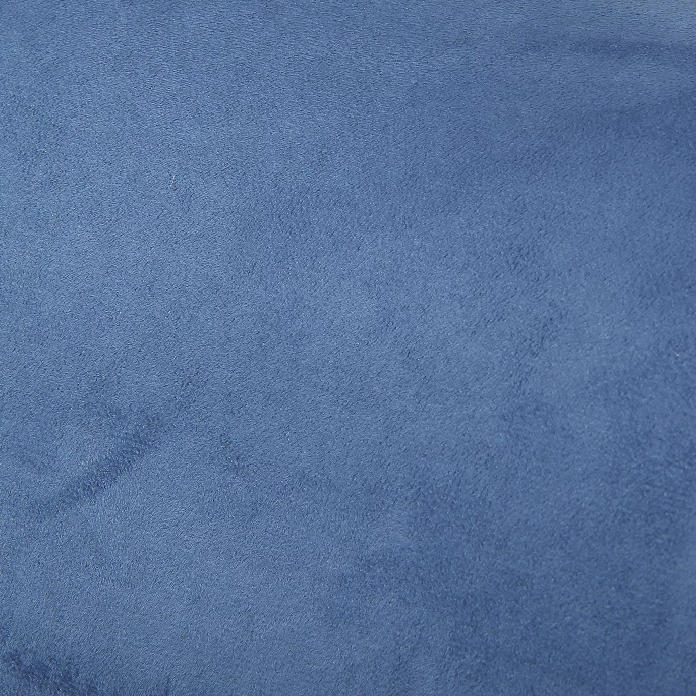 Soft close-up of an Ultra Suede Swedish Blue fabric swatch in a light and serene Swedish blue tone, showcasing its delicate texture and a gentle touch that gives it a feeling of comfort and understated elegance.