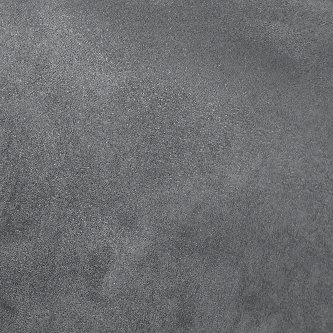 Soft close-up of an Ultra Suede Wild Dove fabric swatch in a soft and sophisticated dove gray tone, showcasing its delicate texture and a gentle touch that gives it a feeling of comfort and timeless elegance.