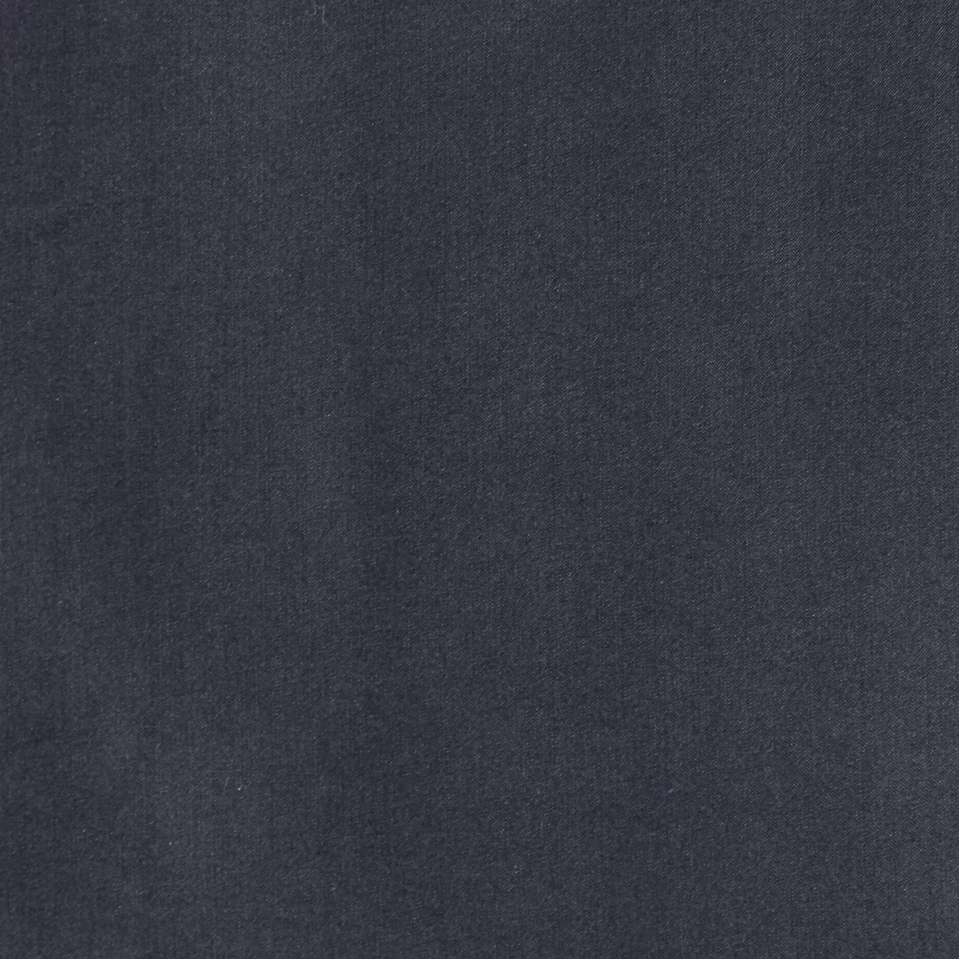 Soft close-up of a Satina Lux Winter Blue fabric swatch in an elegant and cool winter blue tone, showcasing its smooth texture and a subtle sheen that gives it a feeling of sophistication and serenity.