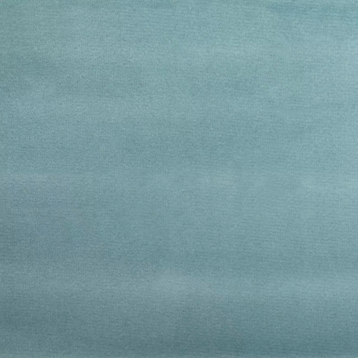 Soft close-up of a Smooth Velvet Capri Blue fabric swatch in an elegant and vibrant Capri blue tone, showcasing its velvety texture and a gentle sheen that gives it a feeling of sophistication and cozy comfort.