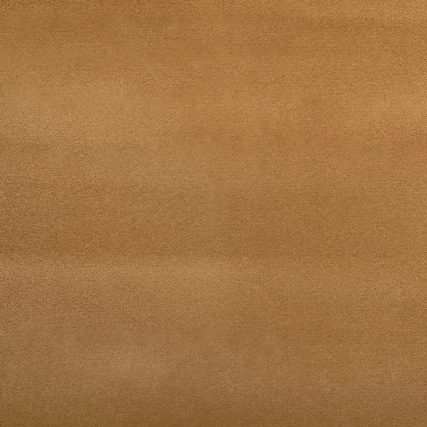 Soft close-up of a Smooth Velvet Curry fabric swatch in a warm and elegant curry tone, showcasing its velvety texture and a gentle sheen that gives it a feeling of sophistication and cozy comfort.