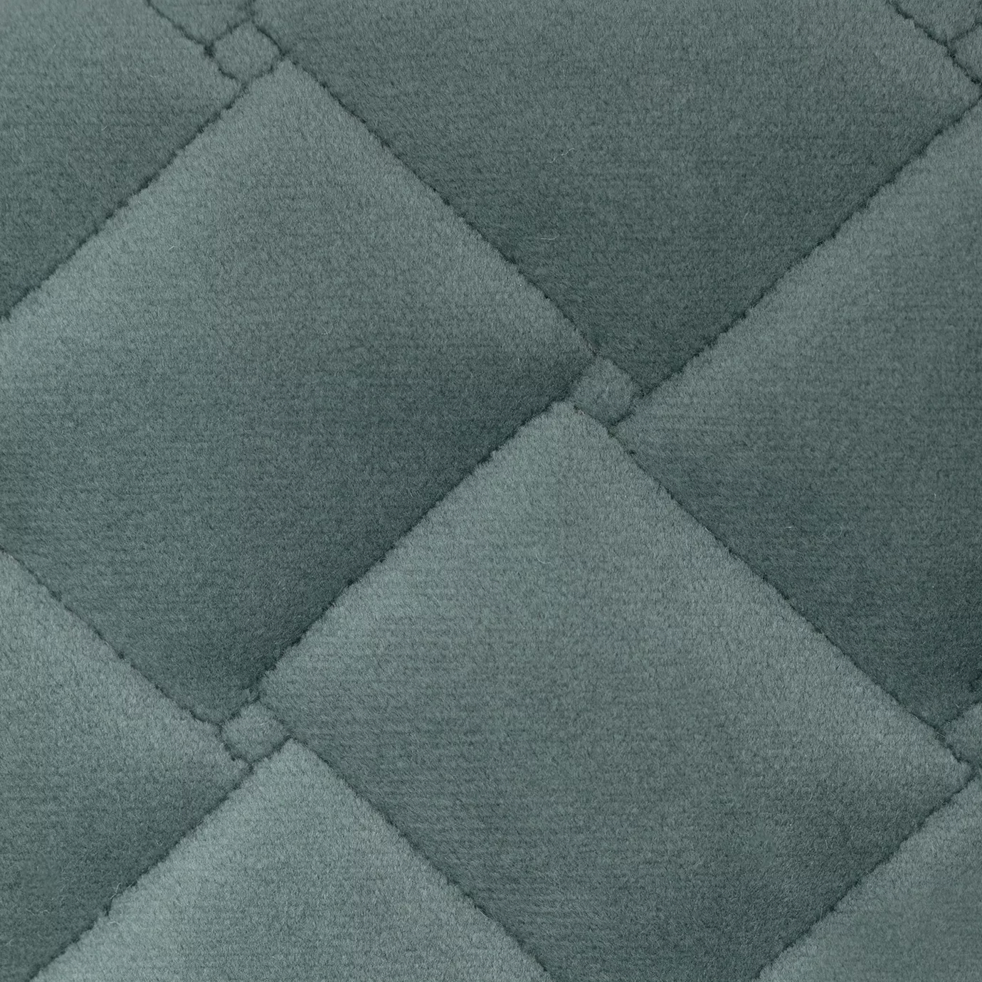 Elegant close-up of the Cloud Velvet Aqua Marine fabric with a soft texture and diamond-quilted pattern in aqua marine color.