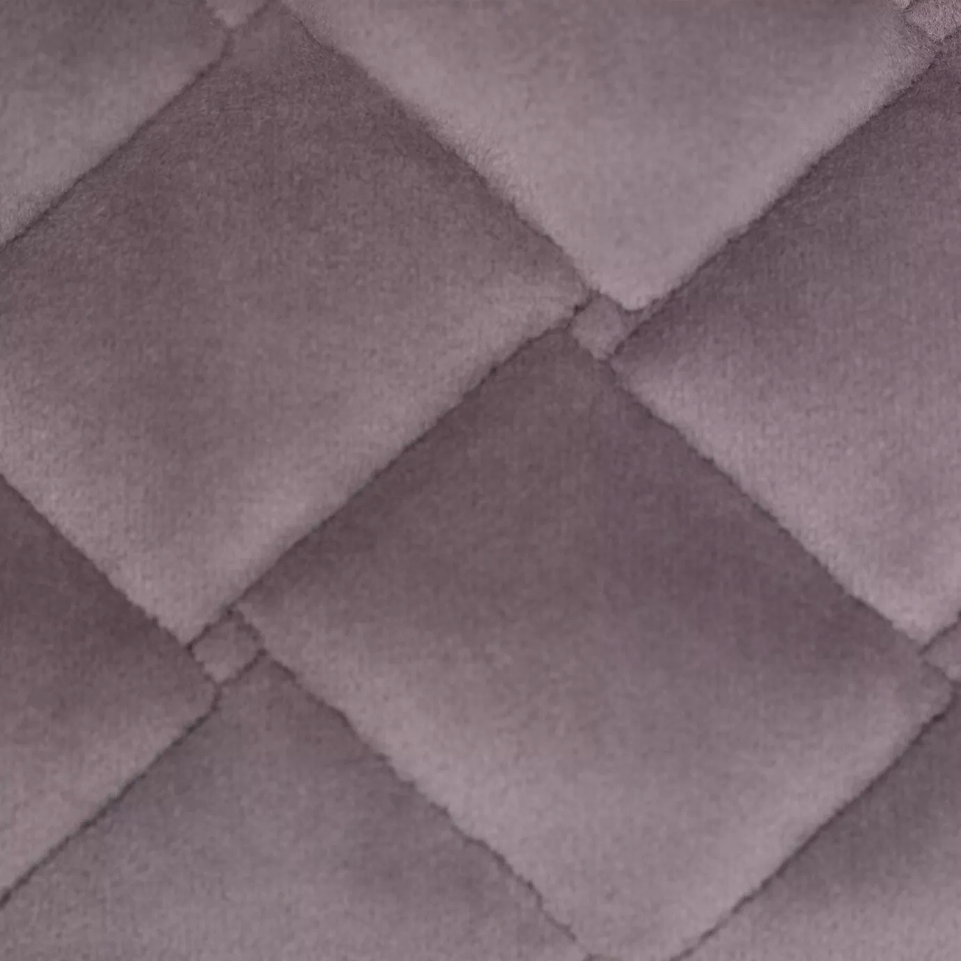 Elegant close-up of a Cloud Velvet Lavander fabric swatch in a soft and delicate lavender tone, featuring a diamond-quilted pattern that gives it a plush texture and a velvety touch, emanating a feeling of serenity and subtle elegance.