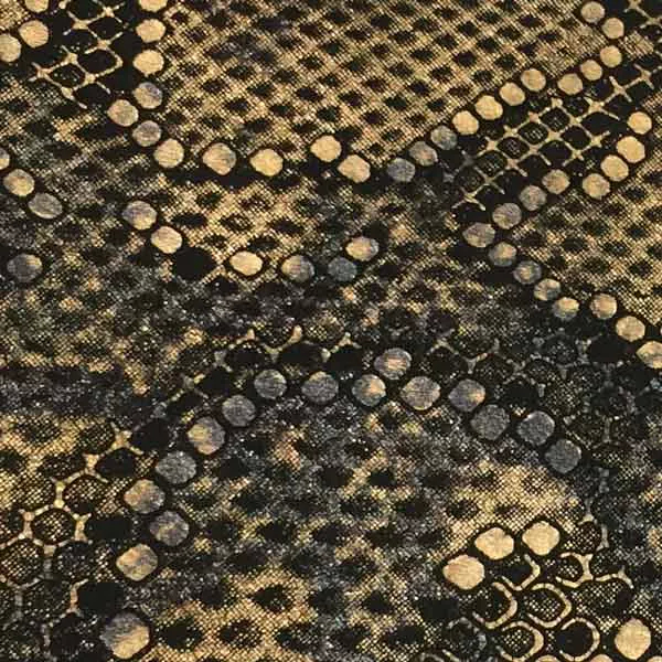 Elegant close-up of a Bitis Gold leather swatch with an exotic pattern mimicking snake skin in shades of black, gray, and gold, featuring a slightly rough texture with distinct scales and shimmering details, evoking a feeling of opulence and bold sophistication.