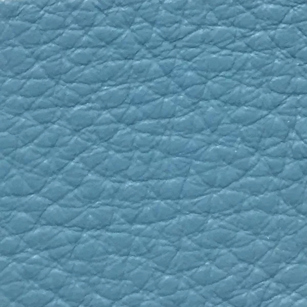 Close-up Harbor Enamel Blue: soft enamel blue, textured and elegant. Soft sheen enhances depth.