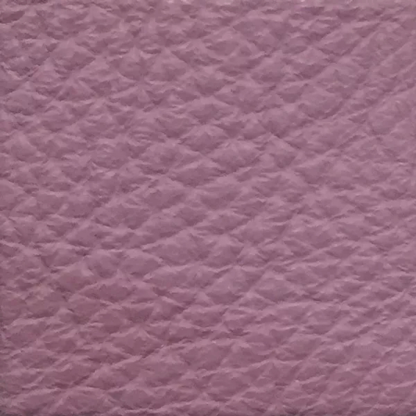 Close-up of a Harbor Lavender Frost fabric swatch in a soft lavender tone with texture, showcasing its raised areas and grooves that give it a natural and elegant feel. The soft sheen highlights the depth of its texture.