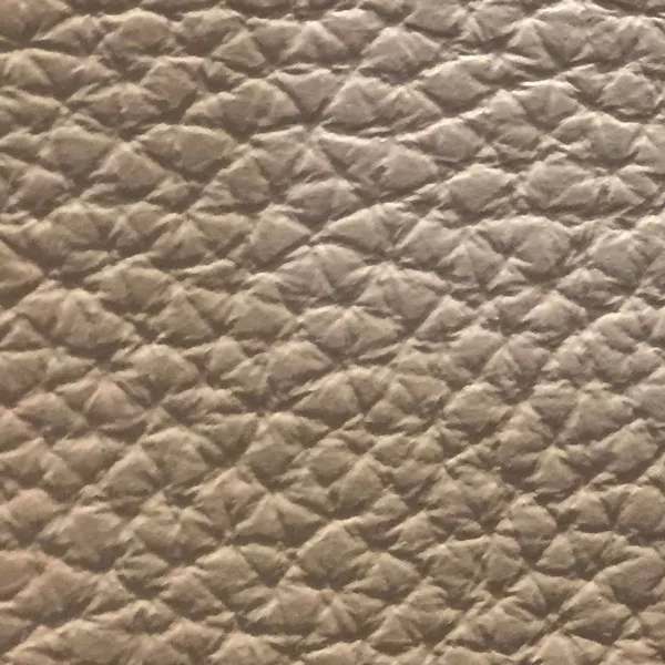 Close-up Harbor Nougat: soft grayish beige, textured, natural & elegant. Soft sheen enhances depth.