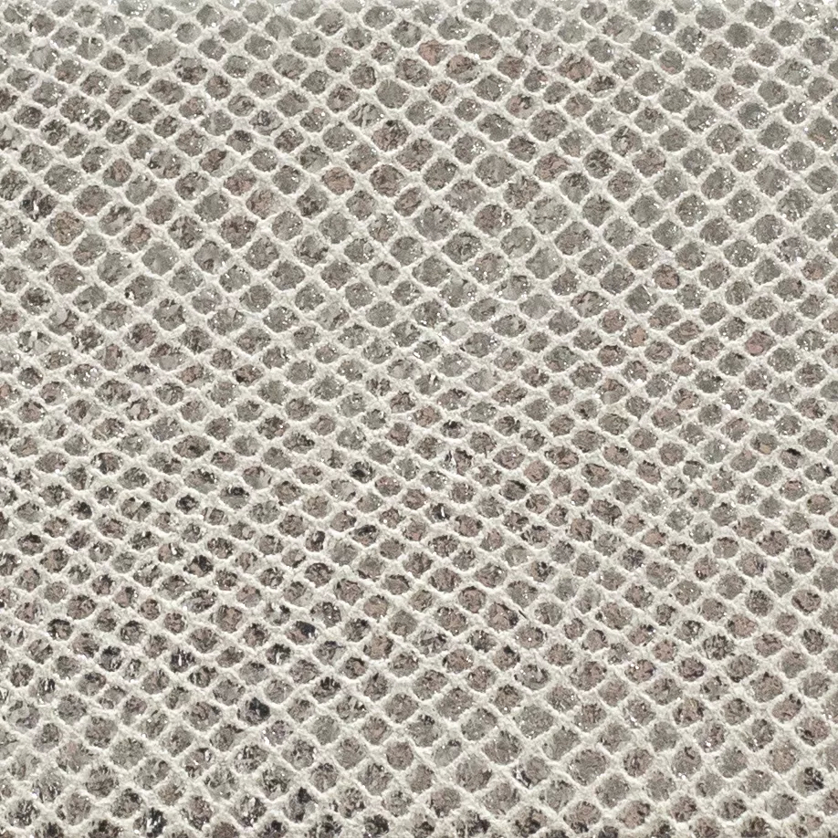 Close-up Salamander Silver Leather: metallic silver leather with a scaled texture. Flat surface with silver light reflections.