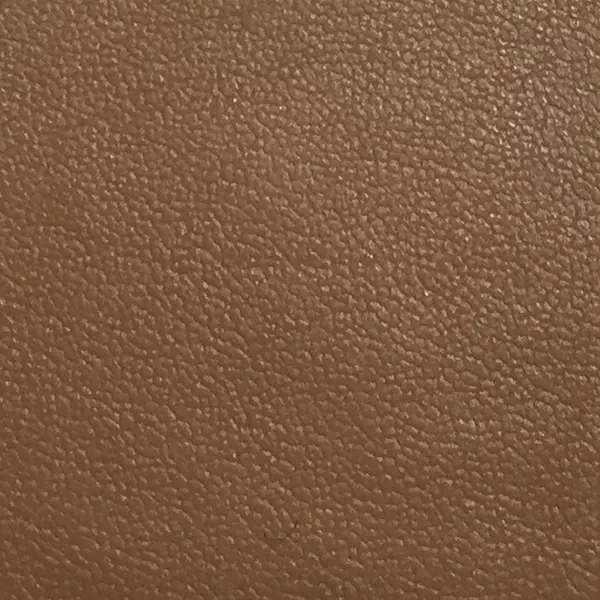 Close-up Jet 12762 Synthetic Leather: light brown synthetic leather with a fine pebbled texture. Features a smooth and even sheen.
