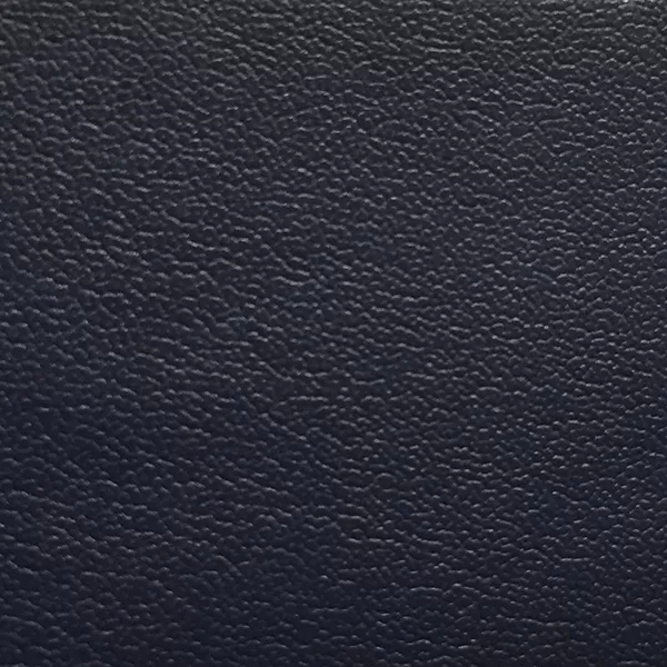 Close-up Jet 8920 Synthetic Leather: dark blue synthetic leather with a fine pebbled texture. Features a smooth and even sheen.