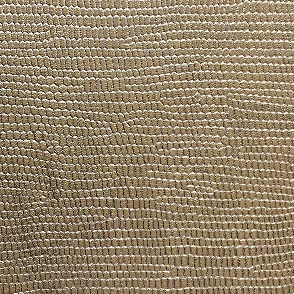 A detailed close-up of Ofidia Platinum Synthetic Leather shows a textured, repeating pattern resembling reptile scales in a light, metallic silver tone.