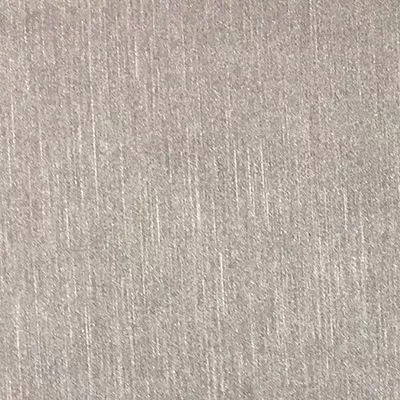 A detailed view of Pearl Synthetic Leather in a soft, light beige shows a fine, vertical ribbed texture with a subtle, pearly shimmer.